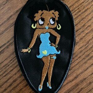Black Betty Boop embroidered patch donning her usual skimpy blue dress and shoes